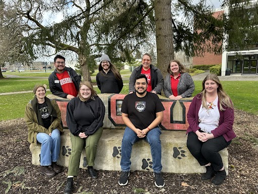 The Staff Connections Committee gathers for a photo at the Grove