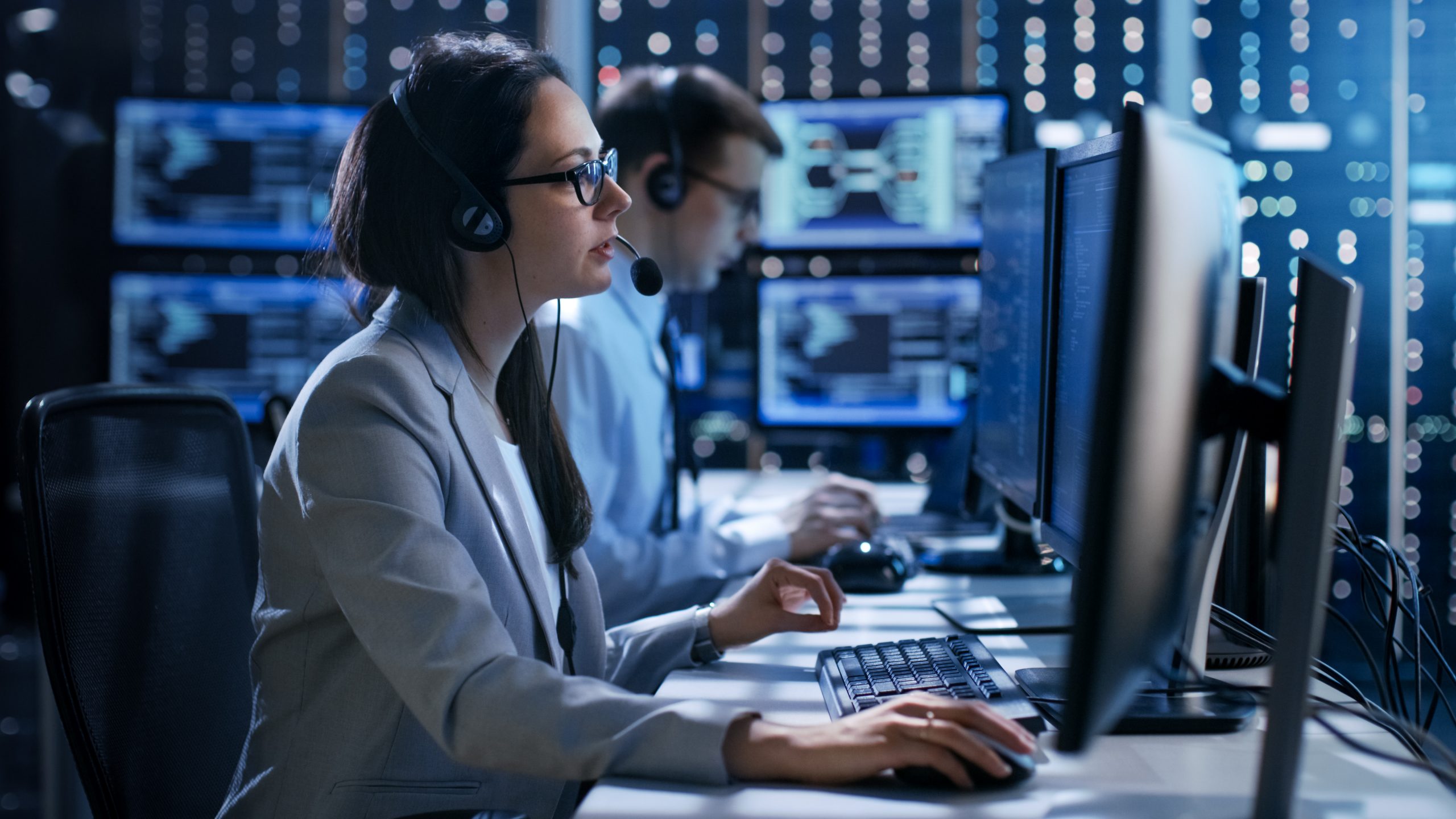 cybersecurity investigator at a workstation